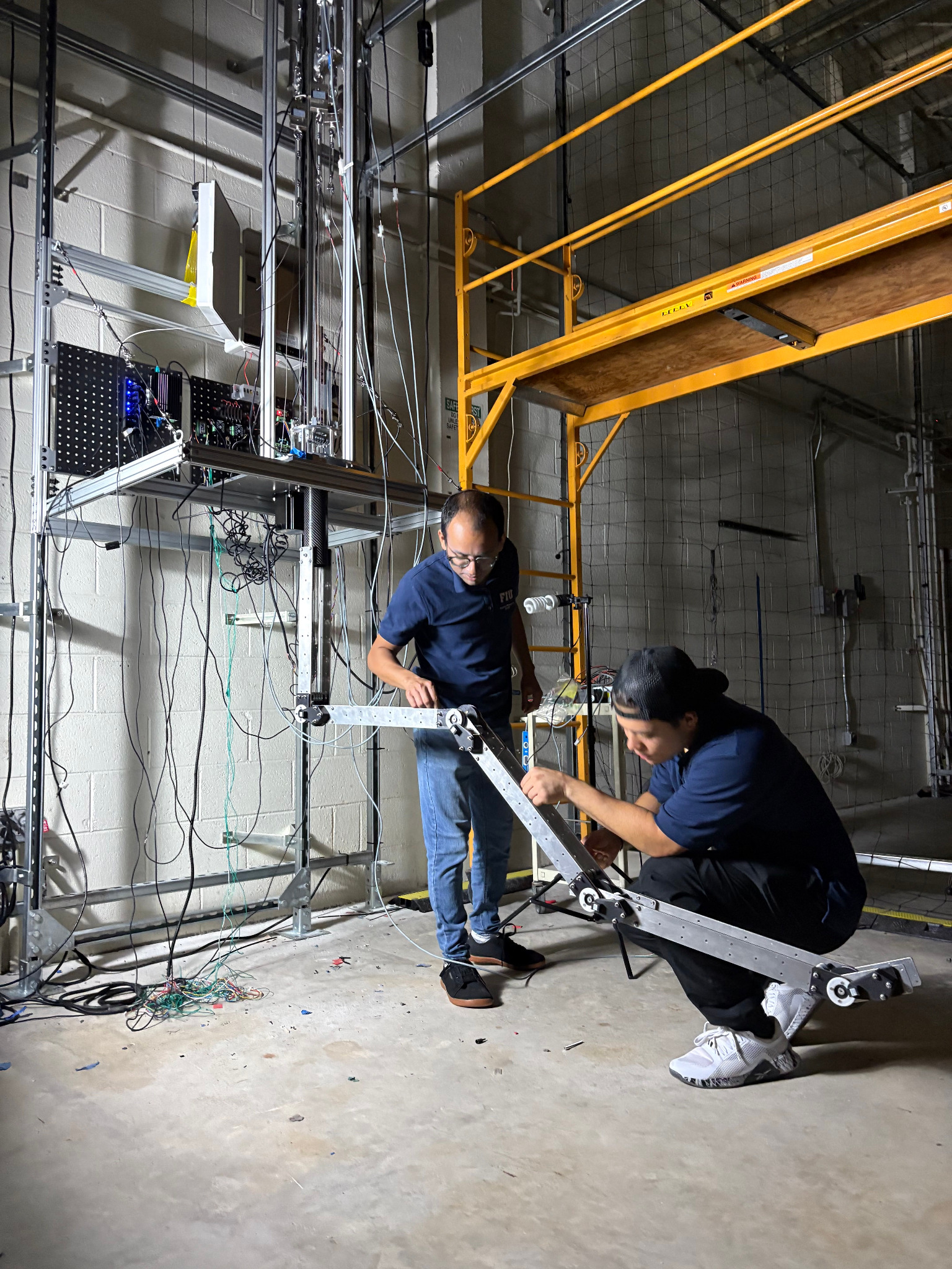 Hands-on integration of the articulated inspection robot with the laboratory team.